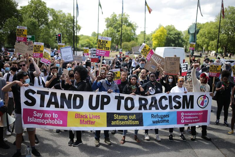 Anti-racism protesters attend a Black Lives Matter demonstration in London. A number of anti-racism protesters gathered in the British capital despite the cancellation of the official event due to fears of clashes with far-right groups.  Getty