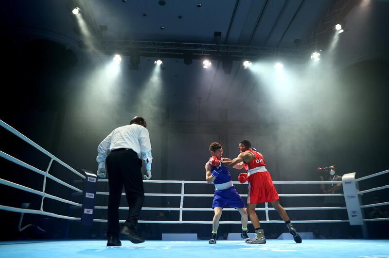 Sultan Al Nuaimi (red) of UAE competes against Kharkuu Enkhmandakh (blue) of Mongolia in their men's flyweight 52kg preliminary bout. The Asian Boxing Championships in Dubai ends on May 30. Getty Images