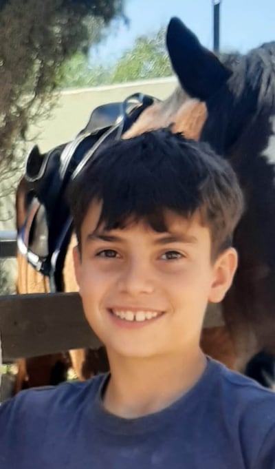 Erez Dan Kalderon, 11, sent a text message warning his mother to be careful when Hamas militants attacked their kibbutz on October 7. He was taken hostage with his 16-year-old sister, father, grandmother and cousin. Photo: Dan Kalderon family