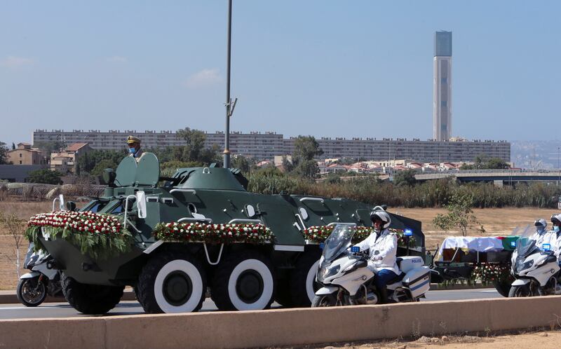 A convoy transporting the coffin of late former Algerian President Abdelaziz Bouteflika heads towards El Alia cemetery, where he will be buried, in Algiers, Algeria.  REUTERS