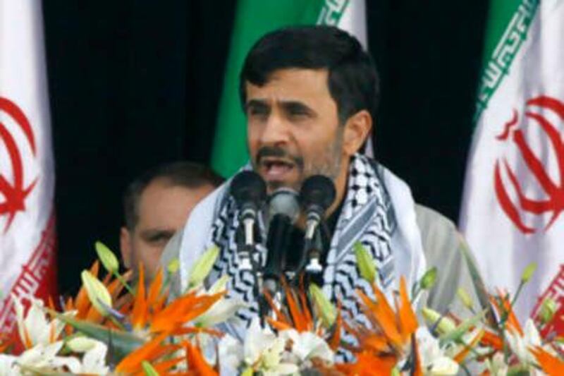 Iranian President Mahmoud Ahmadinejad delivers his speech in a military parade ceremony, marking the 28th anniversary of the onset of the Iran-Iraq war (1980-1988), in front of the mausoleum of the late revolutionary founder Ayatollah Ruhollah Khomeini, just outside Tehran, Iran, Sunday, Sept. 21, 2008. Ahmadinejad said Sunday that Iran's military will "break the hand" of any aggressor that target his country's nuclear facilities. (AP Photo/Vahid Salemi) *** Local Caption ***  VAH104_Mideast_Iran_Nuclear_Military_Parade.jpg