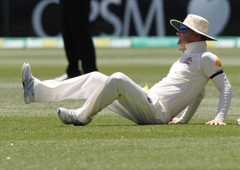 Australia's Michael Clarke shown after injuring himself in the first Test against Indie in Adelaide on Saturday. James Elsby / AP / December 13, 2014