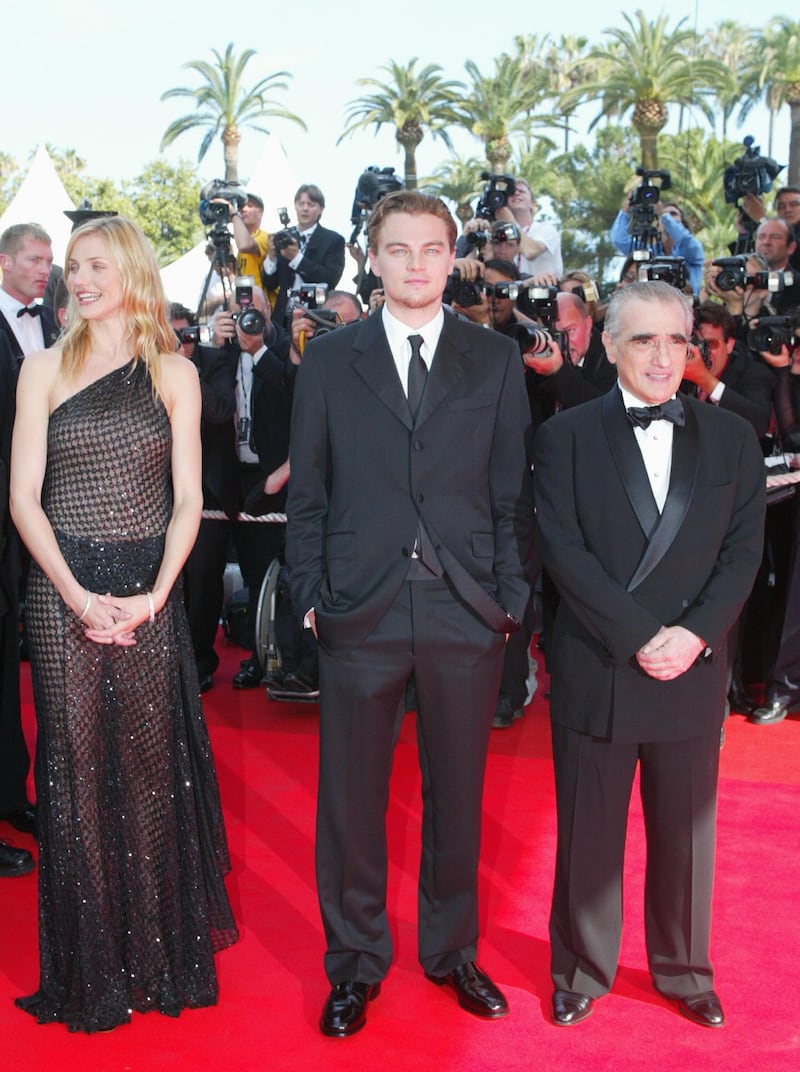 405610 28: (L to R) Actors Leonardo di Caprio, Cameron Diaz, and director Martin Scorsese pose for photographers during the red carpet arrivals for the official screening of director Martin Scorsese's film "Gangs of New York" at the 55th International Cannes Film Festival May 20, 2002 in Cannes, France. Scorsese's film entry is screened out of competition for the film festival. (Photo by Pascal Le Segretain/Getty Images)