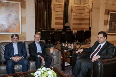 epa08223946 Lebanese Prime Minister Hassan Diab (R) meets with Iranian Parliament Speaker Ali Larijani (C) at the government palace in Beirut, Lebanon, 17 February 2020. Larijani arrived in Lebanon after a visit in Syria.  EPA/NABIL MOUNZER