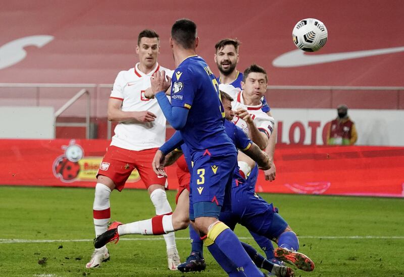 Robert Lewandowski scores Poland's opener. Reuters