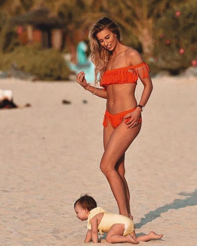 Former The Only Way is Essex star, Ferne McCann, posing on the Le Royal Meridien Beach Resort & Spa beach with her daughter Sunday on January 22. Instagram / Ferne McCann 