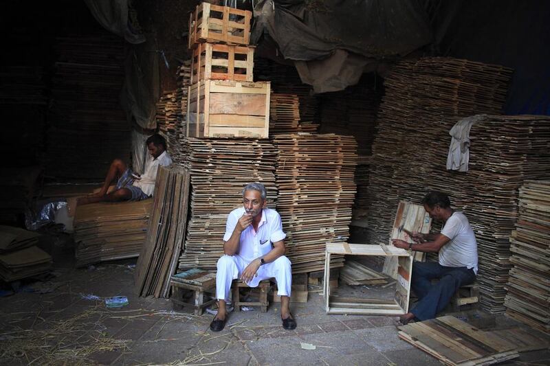 An owner of a packing business takes a tea break. Subhash Sharma for The National