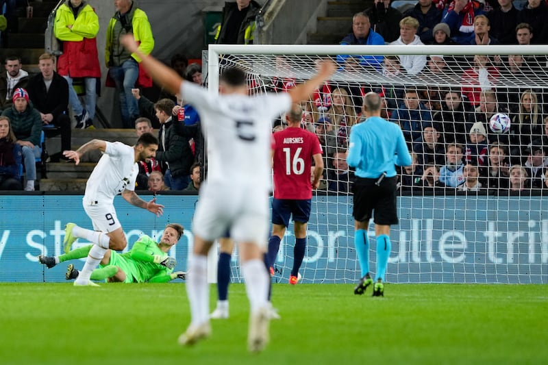 Aleksandar Mitrovic scores Serbia's second goal against Norway. EPA