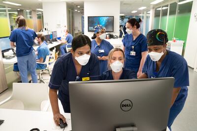 Staff working on a Covid Intensive Care Unit at Kings College Hospital in south London. PA