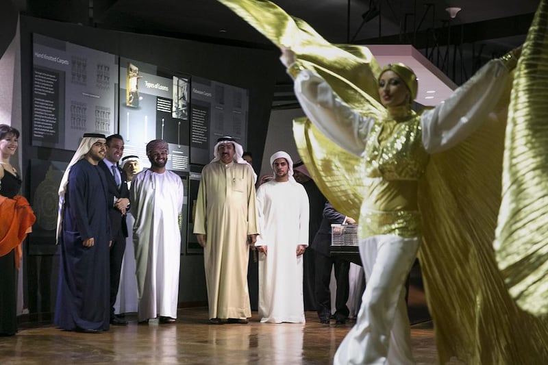 Visitor enjoy the entertainment at the opening of the Miraj Islamic Art Centre in Abu Dhabi. Silvia Razgova / The National