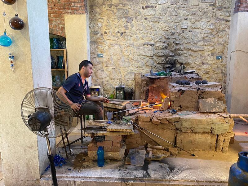 A traditional glass maker, seen while on a tour by Walk Like An Egyptian.