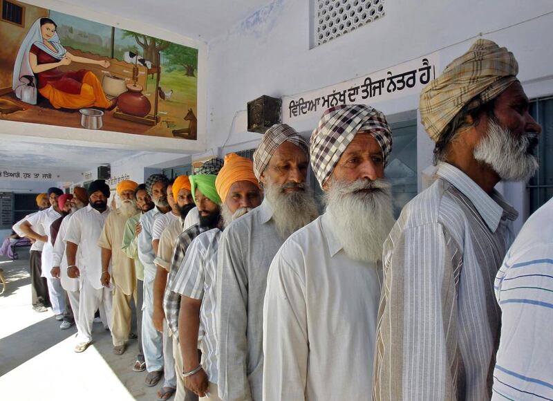 Voters line up to cast their votes outside a polling station during the seventh phase of India’s general election at Rasan Hedi village in the northern Indian state of Punjab. Ajay Verma / Reuters