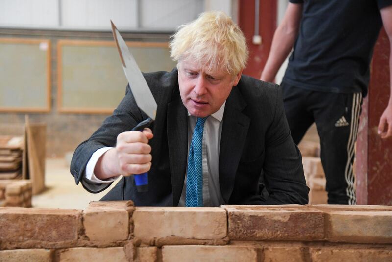 British Prime Minister Boris Johnson during his visit to Exeter College on September 29, 2020 in Exeter, England. Finnbarr Webster/Getty Images