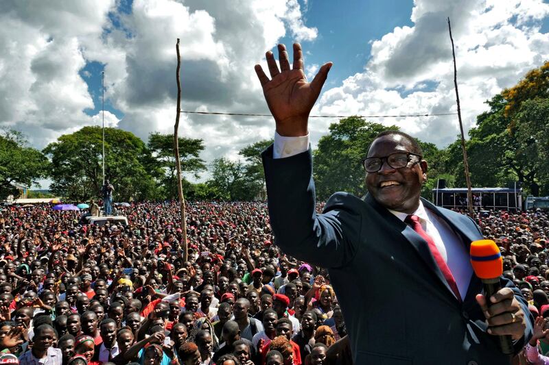 FILE PHOTO: Opposition Malawi Congress Party leader Lazarus Chakwera addresses supporters after a court annulled the May 2019 presidential vote that declared Peter Mutharika a winner, in Lilongwe, Malawi, February 4, 2020. REUTERS/Eldson Chagara/File Photo