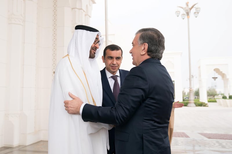 ABU DHABI, UNITED ARAB EMIRATES - March 25, 2019: HH Sheikh Mohamed bin Zayed Al Nahyan, Crown Prince of Abu Dhabi and Deputy Supreme Commander of the UAE Armed Forces (L), receives HE Shavkat Mirziyoyev, President of Uzbekistan (R), at the Presidential Palace. 

( Mohamed Al Hammadi / Ministry of Presidential Affairs )
---