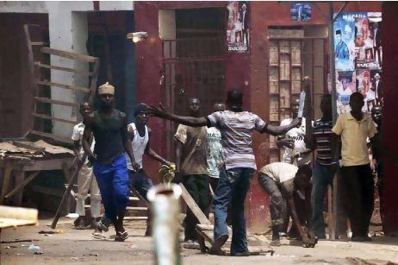 A youth brandishes crude weapons during riots in Bauchi, nothern Nigeria. after Goodluck Jonathan was declared winner of presidential elections.