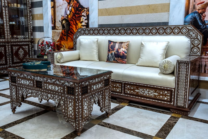 The liwan, or grand hall, is decked with mother-of-pearl furniture designed and crafted by Damascene artisans. 