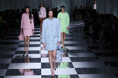 Pastel twinsets and coats at Versace. Getty Images