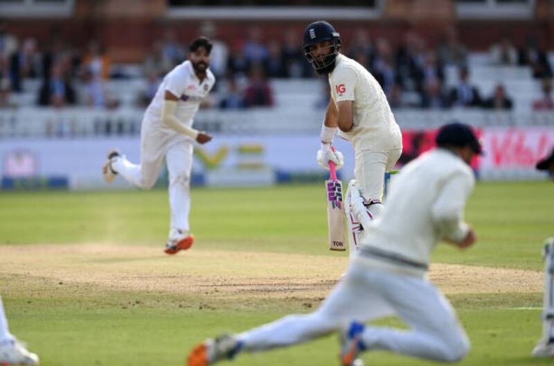 Moeen Ali is caught by Virat Kohli off the bowling of Mohammed Siraj.
