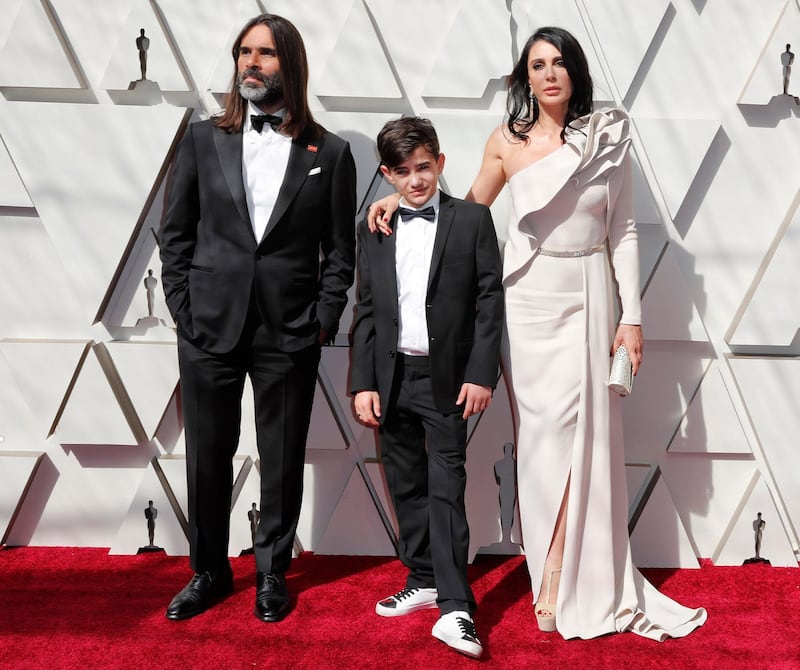 epa07394181 Khaled Mouzanar (L) Zain al-Rafeea (C) and Nadine Labaki (R) arrive for the 91st annual Academy Awards ceremony at the Dolby Theatre in Hollywood, California, USA, 24 February 2019. The Oscars are presented for outstanding individual or collective efforts in 24 categories in filmmaking.  EPA-EFE/ETIENNE LAURENT
