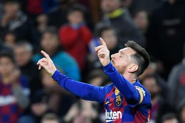 Barcelona forward Lionel Messi celebrates after scoring during the Spanish league football match against Deportivo Alaves at the Camp Nou. AFP