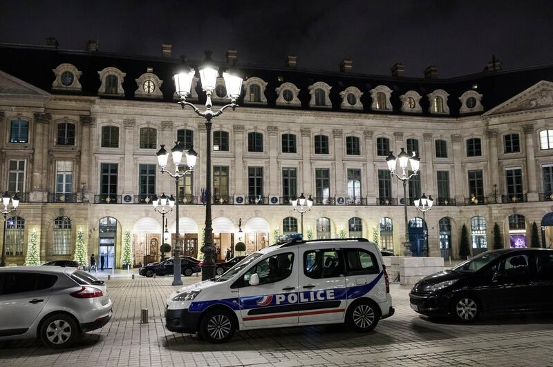 epa06429745 A police car is parked in front of the main entrance of the ritz where a burglary happened in Paris, France, 10 January 2018. According to latest reports, several millions in jewelry were stolen by a group of five individuals among which three were arrested and 2 fled on a scooter.  EPA/IAN LANGSDON