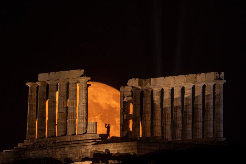 The Super Moon rises behind the Temple of Poseidon, in Cape Sounion near Athens. Reuters
