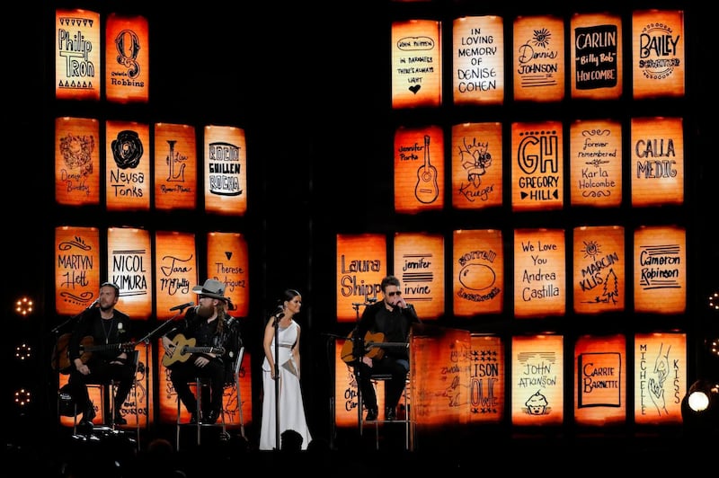Brothers Osborne, Maren Morris and Eric Church perform 'Tears in Heaven' during the in memoriam tribute. Lucas Jackson / Reuters