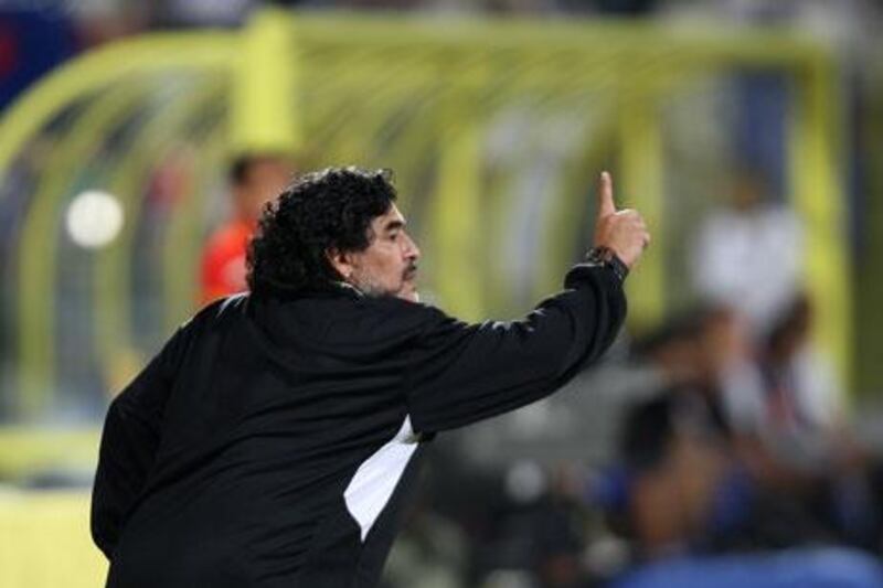 Diego Maradona has been punished after his run-in with Cosmin Olaroiu, the Al Ain coach.