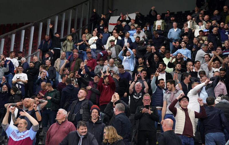 West Ham United fans cheer their team on against AZ. PA