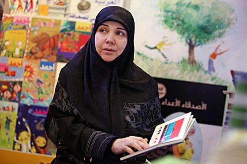 Last year's winner of the Etisalat Prize for Arabic children's literature, Nabiha Mheidly, reads from her book at the Sharjah International Book Fair. She says the award gave her a new sense of responsibility.