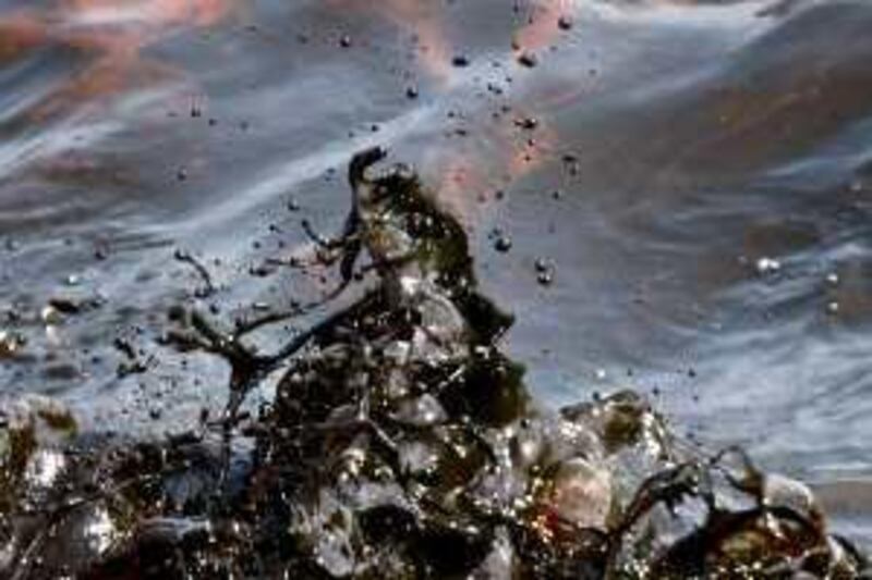 FILE - In this May 9, 2010 file photo, black waves of oil and brown whitecaps are seen off the side of the supply vessel Joe Griffin at the site of the Deepwater Horizon oil spill containment efforts in the Gulf of Mexico off the coast of Louisiana. Environmentalists hope the Gulf oil spill will invigorate the movement and finally persuade Americans to change their energy-dependent lifestyles. The ruptured well has poured more than 4 million of gallons of crude into the sea and counting. (AP Photo/Gerald Herbert, File) *** Local Caption ***  NY109_Gulf_Oil_Spill_Green_Movement.jpg *** Local Caption ***  NY109_Gulf_Oil_Spill_Green_Movement.jpg