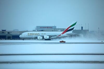 An Emirates A380 lands in the snow. Courtesy Flickr / Wytze van de Belt