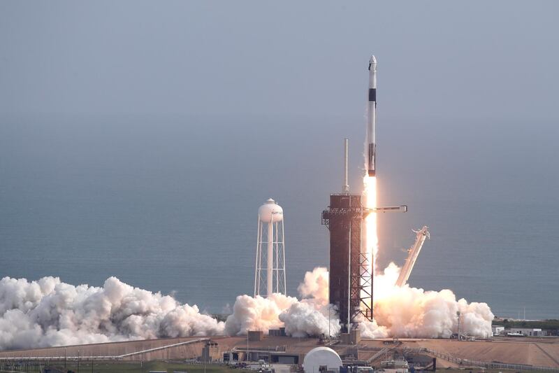 A Falcon 9 SpaceX rocket lifts off from pad 39A during a test flight to demonstrate the capsule's emergency escape system at the Kennedy Space Center in Cape Canaveral, Fla., Sunday, Jan. 19, 2020. (AP Photo/John Raoux)