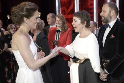 LONDON, ENGLAND - FEBRUARY 10: Catherine, Duchess of Cambridge meets Olivia Colman, and director Yorgas Lanthimos, 2nd right, and writer Tony McNamara, right, after the following the EE British Academy Film Awards at Royal Albert Hall on February 10, 2019 in London, England. (Photo by Tim Ireland - WPA Pool/Getty Images)