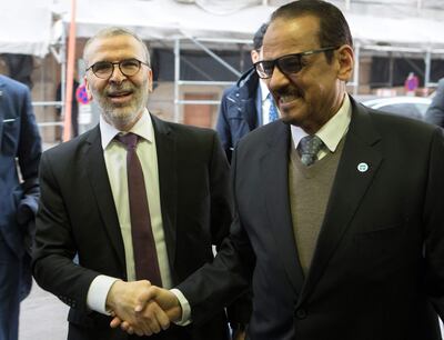 Libya's Mustafa Sanalla, Chairman of the National Oil Corporation (L) arrives for the 178th meeting of the Organization of Petroleum Exporting Countries (OPEC) in Vienna, Austria, on March 6, 2020.  All eyes are on Russia at the gathering of OPEC countries and their allies, with the cartel hoping to convince Moscow to back drastic production cuts to counter the effects of the coronavirus outbreak. / AFP / ALEX HALADA
