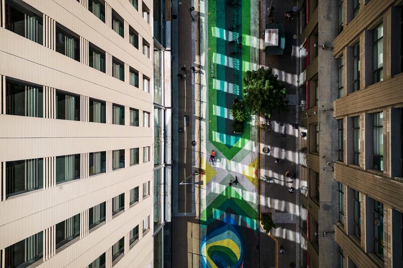 People walk through Paseo Bandera, seen from above, in Santiago, Chile. AP Photo