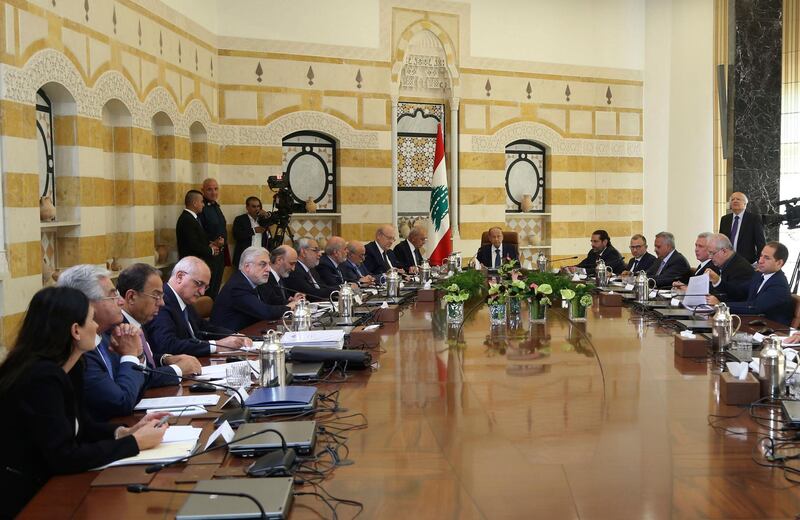 In this photo released by Lebanon's official government photographer Dalati Nohra, Lebanese President Michel Aoun, center, meets with political leaders with the aim of finding solutions to the country's economic crisis, in the presidential palace, in Baabda, east of Beirut, Lebanon, Monday, Sept. 2, 2019. Aoun said in a speech at the opening of the one-day session that everyone should make "sacrifices" in order to get one of the world's most indebted countries out of its problems. (Dalati Nohra via AP)