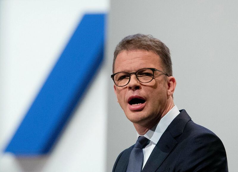 FILE - In this file photo dated Thursday, May 23, 2019, CEO of Deutsche Bank Christian Sewing speaks during the annual shareholders meeting in Frankfurt, Germany. Germany's struggling Deutsche Bank said Sunday July 7, 2019, it will cut some 18,000 jobs by 2022, and shares rose 2.5 percent on Friday as markets anticipated a restructuring announcement. (AP Photo/Michael Probst, FILE)