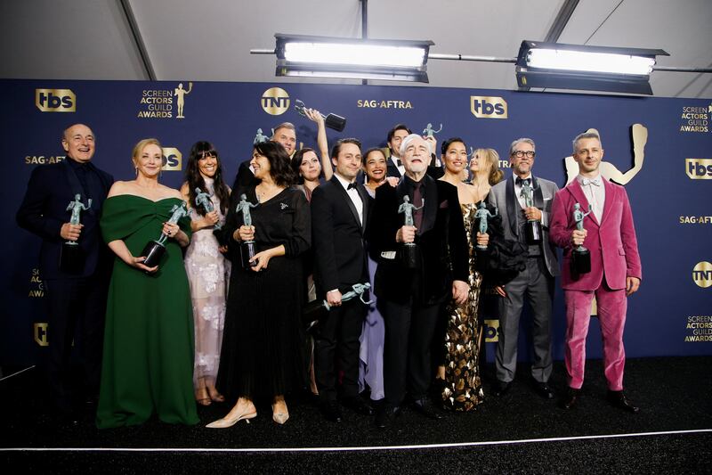 The cast of 'Succession' backstage with their Outstanding Performance by an Ensemble in a Drama Series trophies at the 28th Screen Actors Guild Awards, in Santa Monica, California. Reuters