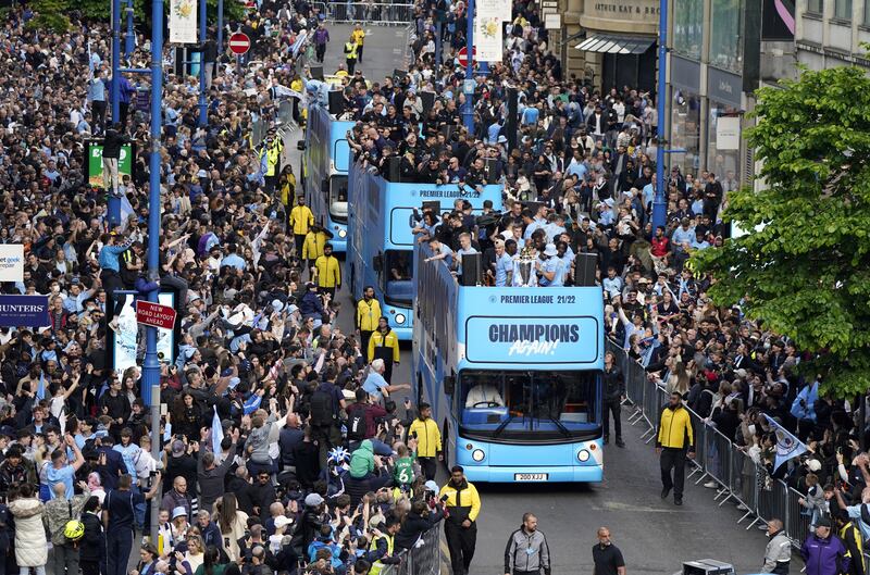 Manchester City players on the open-top bus during the Premier League trophy parade. PA