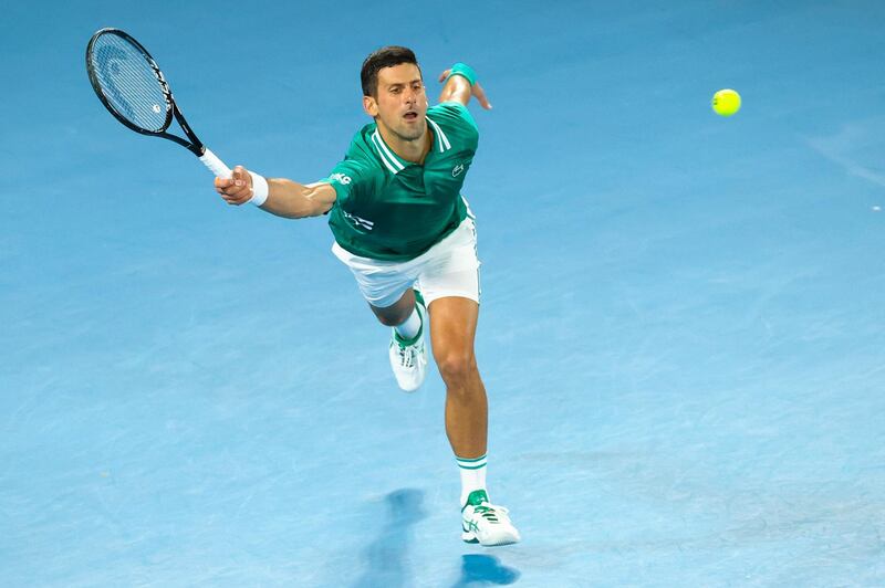 Novak Djokovic hits a return against Alexander Zverev. AFP