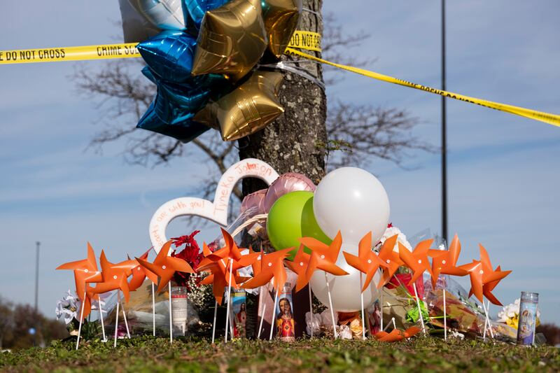 A memorial is set up outside of the Chesapeake, Virginia, Walmart. The Virginian-Pilot / AP