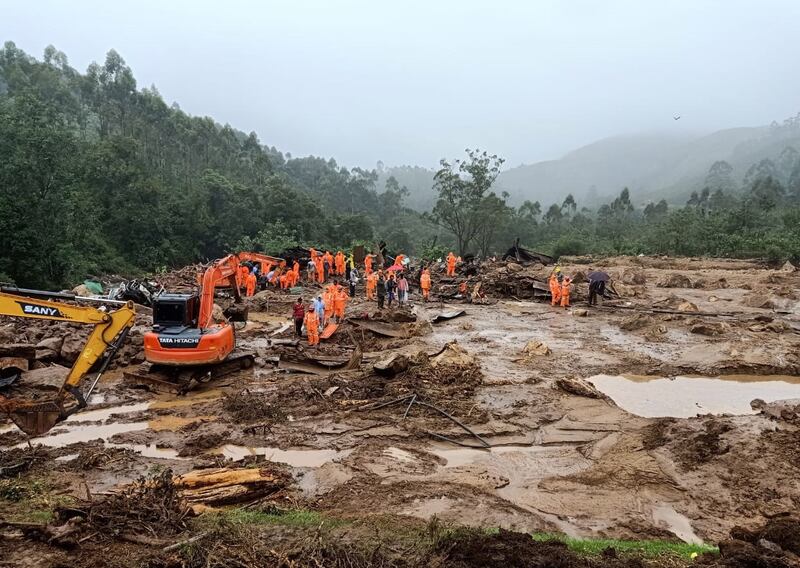 NDRF team carries out rescue and relief work at the site of landslide at Rajamalai in Idduki, Kerala.  EPA
