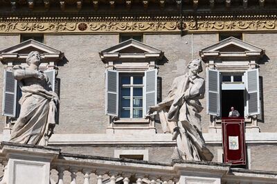 Pope Francis addresses the crowd during prayer at the Vatican on November 1. AFP