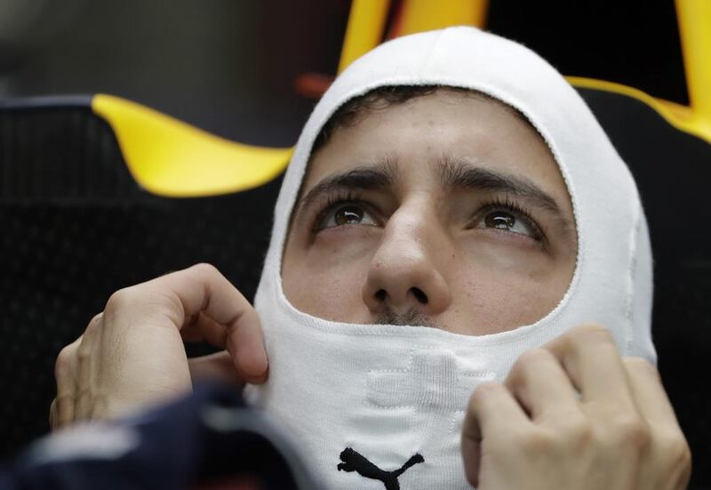 Red Bull driver Daniel Ricciardo of Australia prepares for the third practice session for the Singapore Formula One Grand Prix on the Marina Bay City Circuit. Wong Maye-E / AP Photo