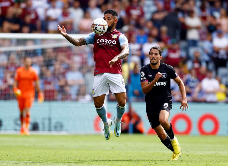Aston Villa's Douglas Luiz in action with West Ham United's Pablo Fornals. Reuters