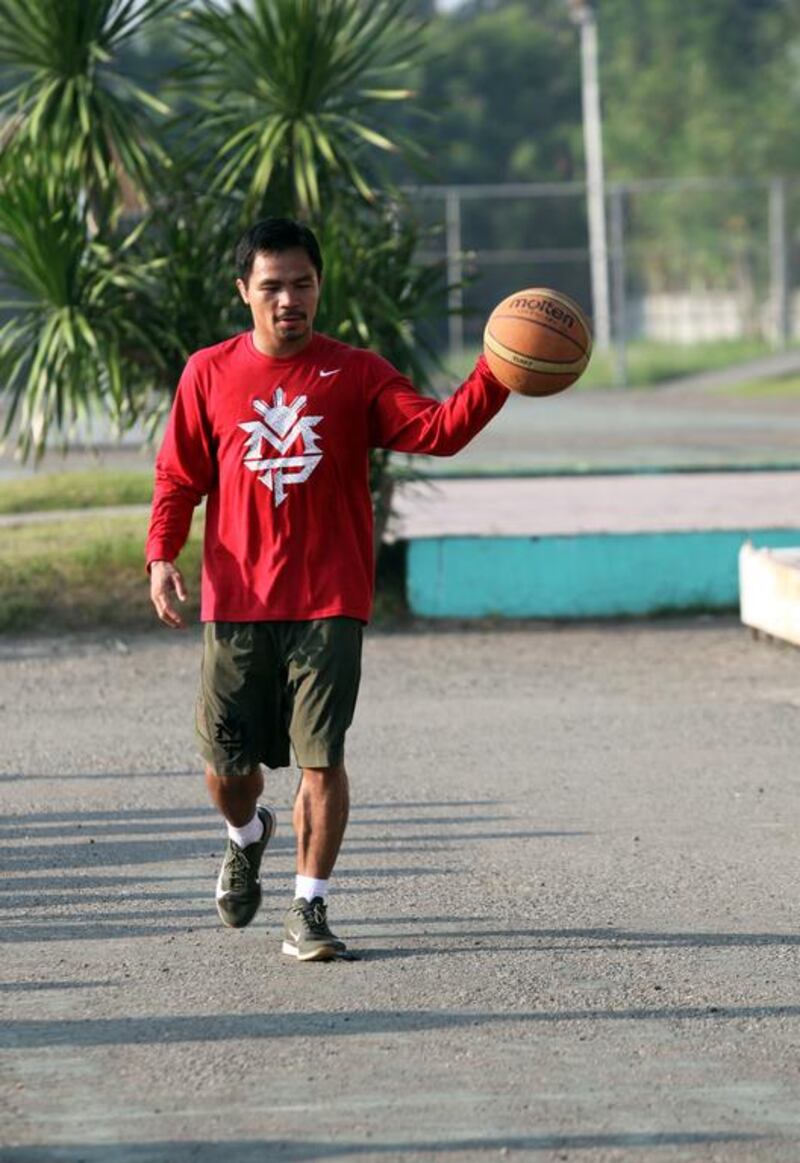 Manny Pacquiao has maintained basketball to be his first love even as he grew up to be a superstar boxer. Jeoffrey Maitem / Getty Images