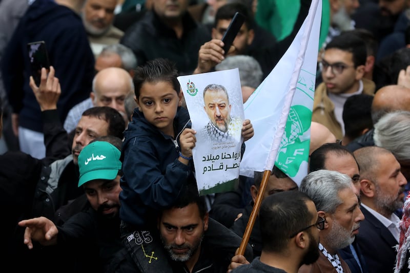 Supporters of Hamas and other political factions attend the funeral in Beirut. Getty Images