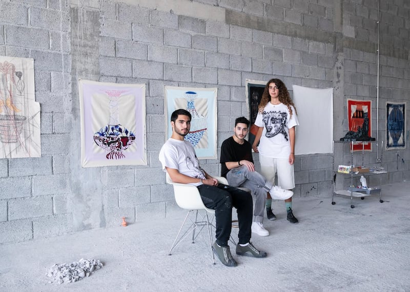 DUBAI, UNITED ARAB EMIRATES. 6 AUGUST 2020. 
Ziad Al Najjar, Talal Al Najjar, and Moza Almazrouei in their studio in Galleria Mall, Al Barsha.

(Photo: Reem Mohammed/The National)

Reporter:
Section: